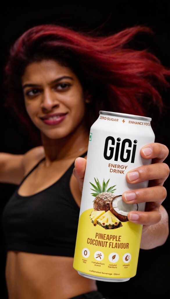 Smiling person holding a Gigi can